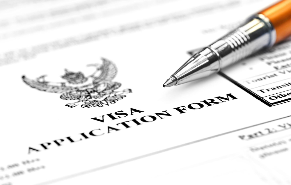 Visa application form with ballpoint.jpg